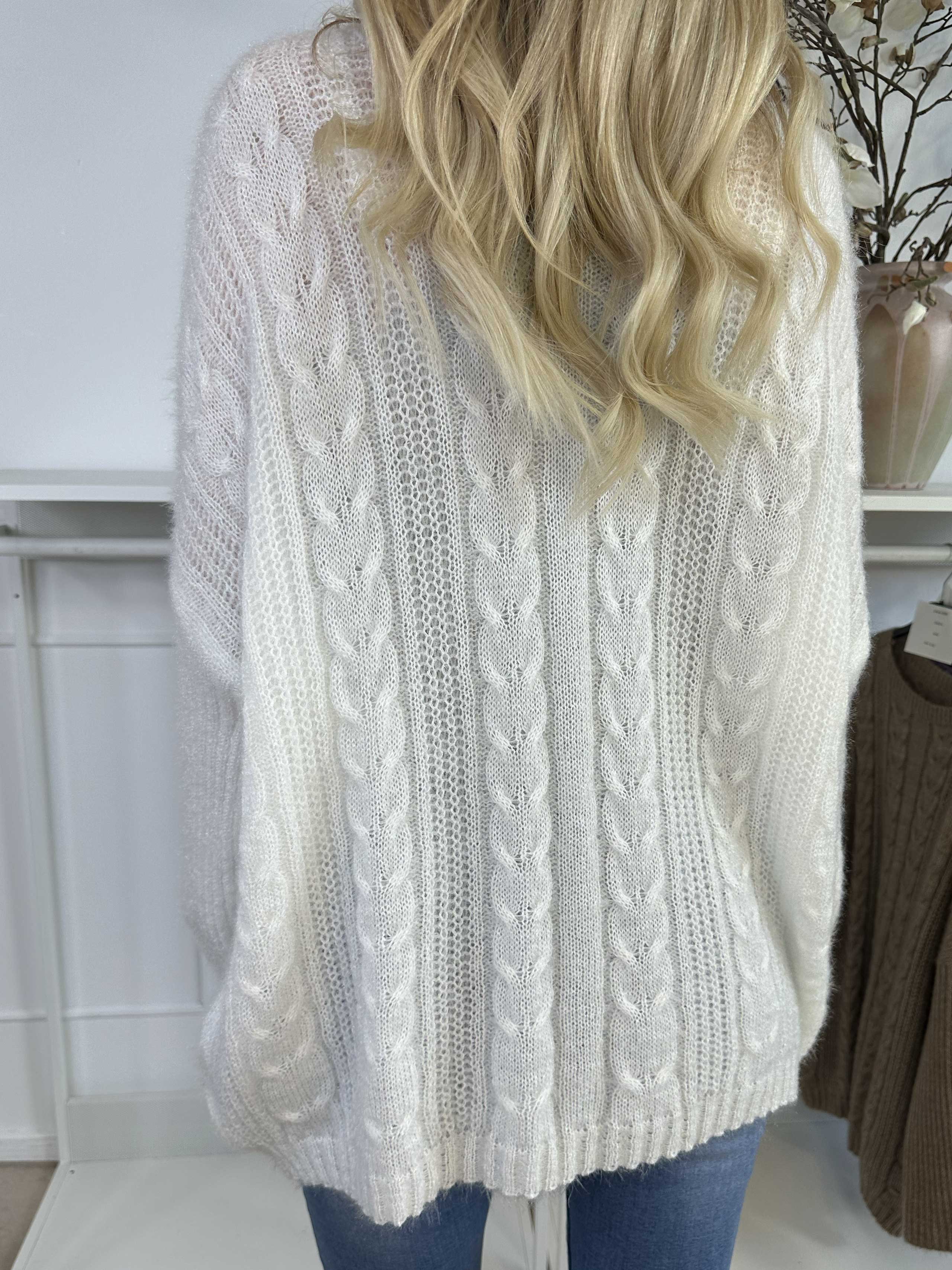 Johanna - Stickad blus i glansig trikå